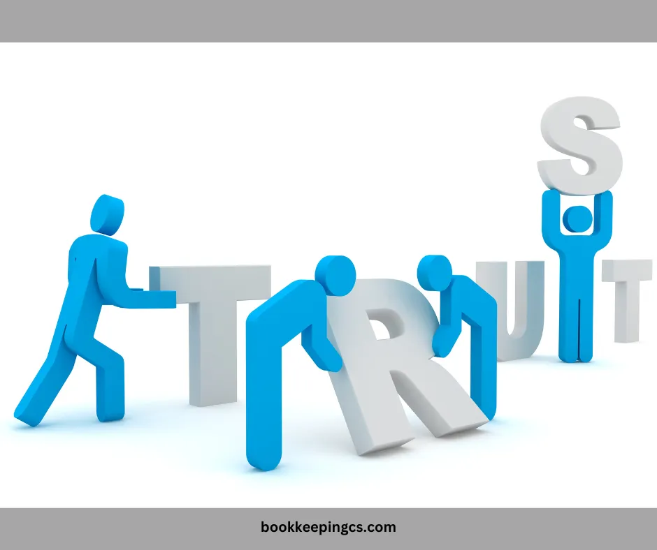 Small figures assembling the word Trust