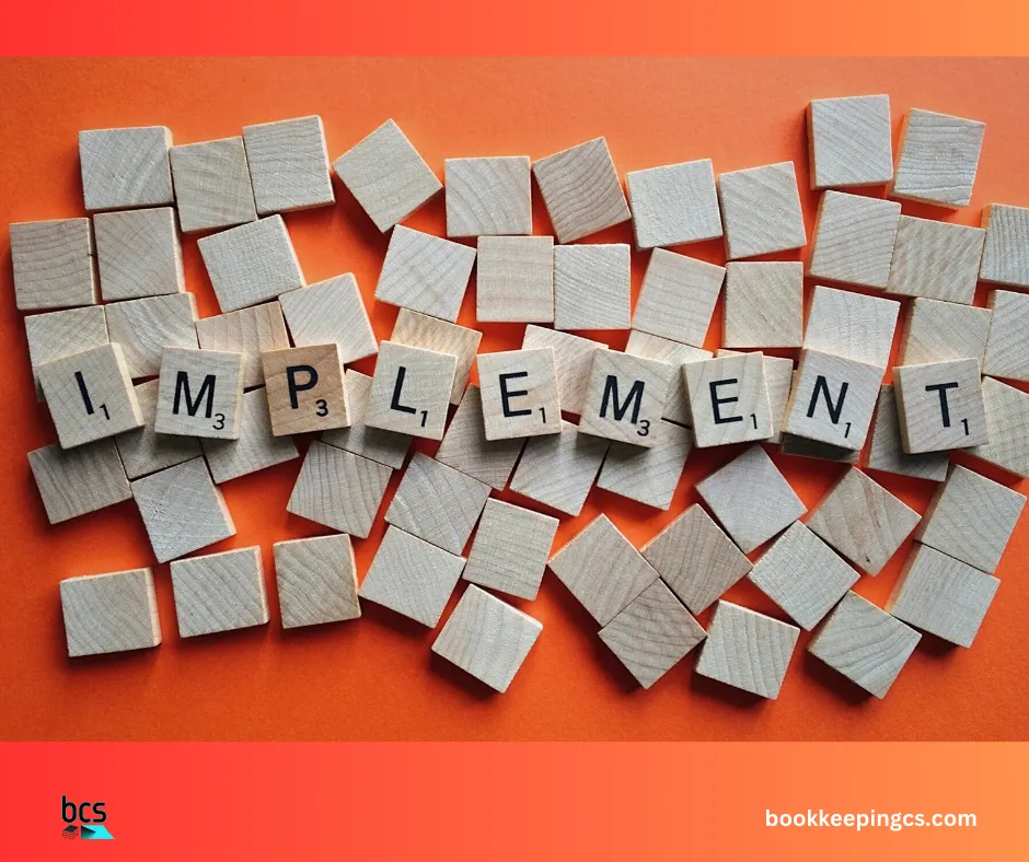 Letter tiles spelling the word Implement